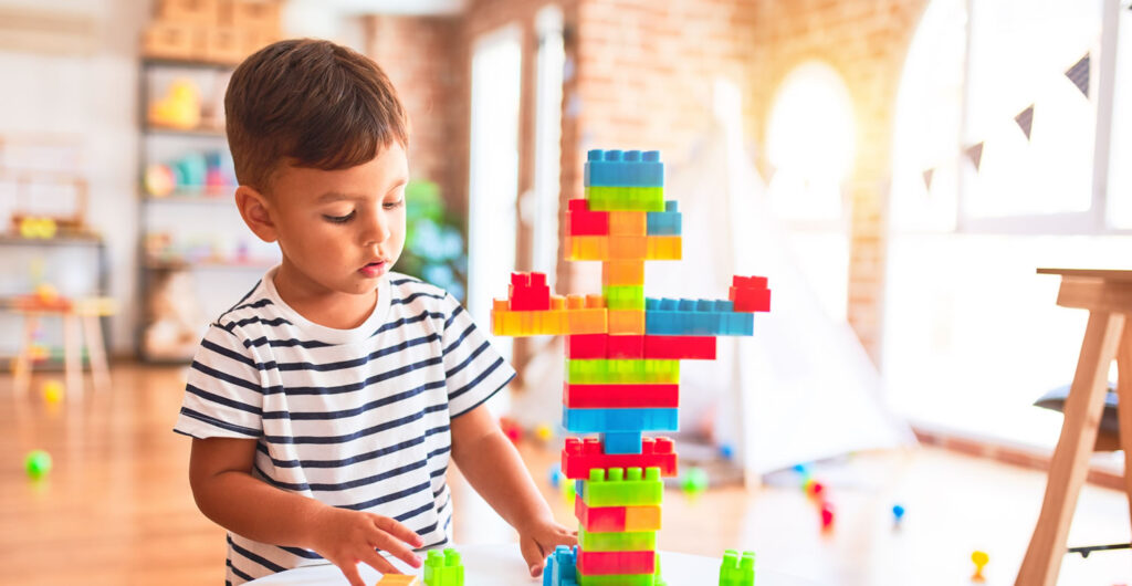 A child playing with the building blocks