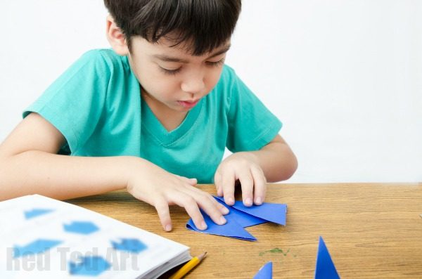 A child playing Origami