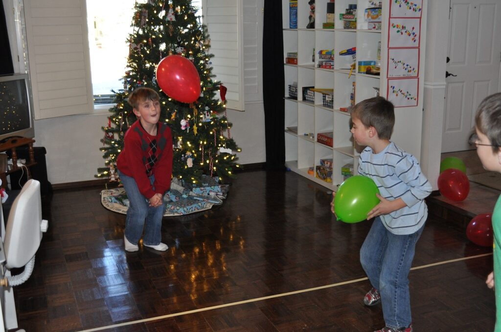 Kids playing Balloon Volleyball