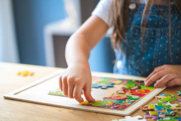 A girl playing Puzzles